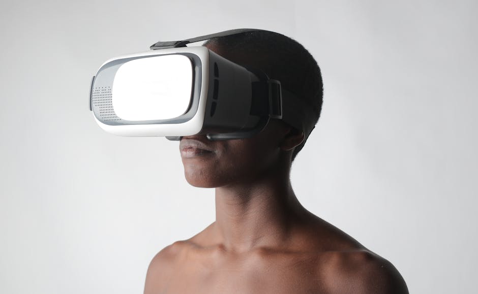 Close-up of a person using VR goggles, showcasing futuristic technology and innovation.
